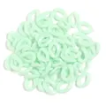 Close-up detail of mint green acrylic open chain links, perfect for DIY jewelry and crafts. - L 23mm, W 16.5mm, Wire Diameter 5mm / 50 Pieces Set / Aqua Green