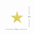 Detailed shot of yellow star embroidered patch, mini DIY applique for clothing repair and decoration. - Cartoon Star / Yellow