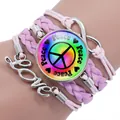 Handmade pink multi-layer braided bracelet featuring colorful peace sign and Love charm - Pink