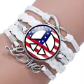 Handmade multi-layer braided bracelet featuring peace sign US flag and infinity charms - White