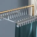 Pinzas para pantalones de acero inoxidable gris sereno, perchas resistentes con revestimiento. - Gris Tranquilo