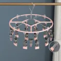 Round stainless steel drying rack with clips, pink color, space-saving for socks and underwear. - Round 20-Clip Drying Rack / Sakura Pink