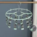 Stainless steel round drying rack with mint green clips, perfect for socks and underwear. - Round 20-Clip Drying Rack / Mint Green