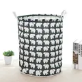 Collapsible fabric laundry basket featuring white polar bear pattern and sturdy handles - Polar Bear