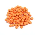 Closeup of vibrant orange acrylic flat round loose beads, perfect for DIY jewelry and bracelets. - 100 Pieces (Approx. 7mm Diameter) / Orange
