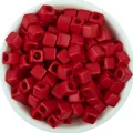 Detailed view of vibrant red square acrylic beads in a white bowl, perfect for DIY jewelry making. - 7x7x7mm / 100 Pieces/Pack / Red
