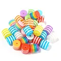 Close-up of translucent resin rainbow white striped barrel beads for DIY bracelets. - 100 Pieces/Pack / Random Mixed Colors