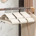 Cream white non-slip stainless steel clothes hangers, seamless thick coat hangers for closet. - Cream White