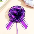 Detailansicht einer lila Geschenk-Ziehschleife für festliche Geschenkverpackungen - Lila