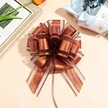 Eleganter kupferfarbener Zugbogen für Geschenkboxen und festliche Geschenkverpackung - Kaffeebraun