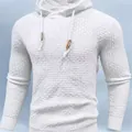 Detailed macro view showing the waffle knit texture of this white men's pullover hoodie - S / Top (sy796#) / White