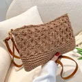 Handmade brown straw woven beach bag with hollow-out floral pattern and shoulder strap - Khaki