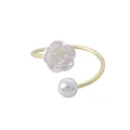 Elegant gold-tone napkin ring featuring a white camellia flower and pearl decor for dining. - Camellia Flower Pearl Style (Z1050-2)