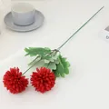 Close-up detail of artificial red chrysanthemum flower arrangement for home decor scene styling. - Two-Headed Pompon Chrysanthemum - Red