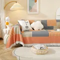 Housse de canapé géométrique style ins nordique avec carreaux orange et franges pour toutes saisons - 130x180cm (Fauteuil) / Moment de Bonheur