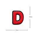 Red and black embroidered letter D patch close-up, clothing accessory DIY repair detail. - Letter D