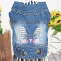 Close-up of a blue denim pet vest featuring cute rabbit embroidery and metal buttons. - L / Rabbit Style / Denim Blue