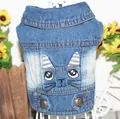 Detail of denim pet vest featuring cute cat embroidery and antique metal buttons - XS / Cat / Denim Blue