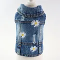 Macro view showing the daisy embroidery and distressed texture of this denim dog vest - XS / Dark Blue (3 Daisies)