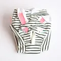 Detail view of striped dog physiological pants with pink rabbit ears and tail hole - S / White Rabbit Striped