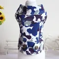 Detailed close-up view of a blue camouflage pet dog vest featuring decorative buttons - XS / Tops / Blue and White Camouflage