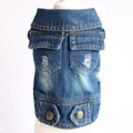 Detail view of a distressed blue denim pet vest with decorative pockets - XS / Double Pocket Vest