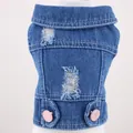 Macro view of a blue distressed denim vest for small dogs with pink button accents. - XS / Pink Buttons & Distressed