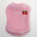 Close-up of pink plush dog vest featuring a cute red strawberry embroidery detail. - Pink Strawberry Style