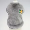 Detailed view of a grey furry pet vest with a cute embroidered orange patch design - XS / Gray