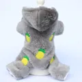 Detail showing soft gray plush fabric and yellow pineapple embroidery on dog onesie - XS / Gray