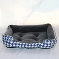 Close-up view of a cozy houndstooth pet bed showing its soft grey plush lining - XS Size 45-30CM / Blue Houndstooth