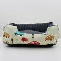 Cozy cartoon car print pet bed for dogs and cats with a soft grey quilted lining - Car / XS