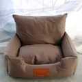 Detailed view of the brown faux-leather pet sofa bed with soft interior cushion. - XS / 35*45cm / Coffee Technical Fabric