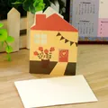 Creative house-shaped hollow greeting card with cute floral design for holidays - Flower Hut
