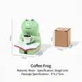 Cute miniature green resin frog figurine holding coffee and book with product dimensions - Coffee Frog