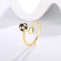 Close-up detail of a minimalist adjustable golden ring with soccer ball and heart charms - Soccer Style (KYRA0360-1)