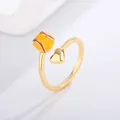 Detail view of a yellow enamel baseball and gold heart on an open gold-plated ring - Baseball Style (KYRA0360-4)