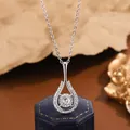 Detailed macro shot of an elegant teardrop zircon pendant necklace with silver chain - Simple Hollow Waterdrop / KYNL0411 (Simple Hollow Waterdrop Style)