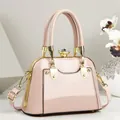 Sac à main élégant en cuir verni rose avec cadre doré et un fermoir bijou chic - 21*11*15 / Kaki