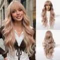 Detail view of a rose gold long wavy wig with natural bangs and realistic curls - 28 inch / Rose Gold (1376-1)