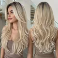 Front and back view of a long wavy platinum blonde gradient wig with curtain bangs - Ombre Platinum Blonde