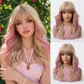 Long wavy blonde wig with pink highlights and bangs shown on model and mannequin - Gold Pink Highlight (1435-1)
