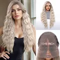 Detailed view of long wavy blonde wig showing model fit and 13x6 lace construction. - 28 inch / Gradient Gold