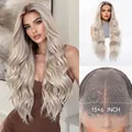 Detailed macro view of the 13x6 lace front wig cap with long ash blonde wavy hair texture - White Gold