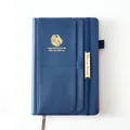 Navy blue faux leather 18-month 2024-2025 planner with gold foil lion logo - Blue