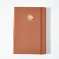 Luxe A5 notitieboek van bruin echt leer met goudgestempeld leeuwenlogo en elastiek - A5 / Bruin