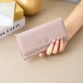 Premium long dusty pink wallet for women in pebbled leather with sleek metal clasp - Pink
