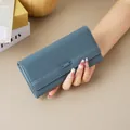 Elegant dusty blue long leather wallet for women with minimalist textured finish - Blue
