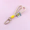 Durable beige nylon braided lanyard keychain with yellow accent and matte carabiner hook - Beige And Yellow