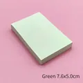 Macro view of light green rectangular sticky note pad measuring 7.6x5.0cm for office - 7.6x5cm / Green